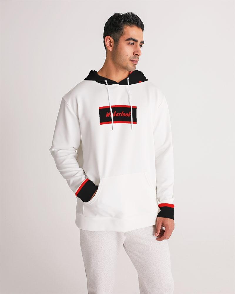 Man wearing a white hoodie with black and red accents on a plain background